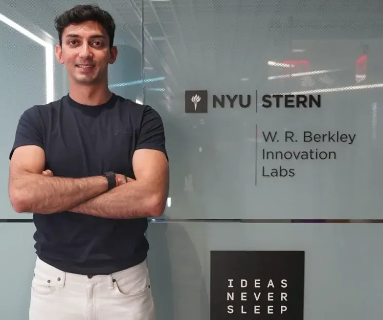 krish-in-front-of-nyu-stern-1-8422460ffbda01897b25c6a2d04f477a1bfce933.webp